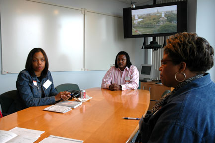 Atlanta Team meeting at the Organizational Session, May 2005.  (Left to right: National Fellows Ishan Z. Malik, Marty L. Cummings, and Susan H. Greene.)