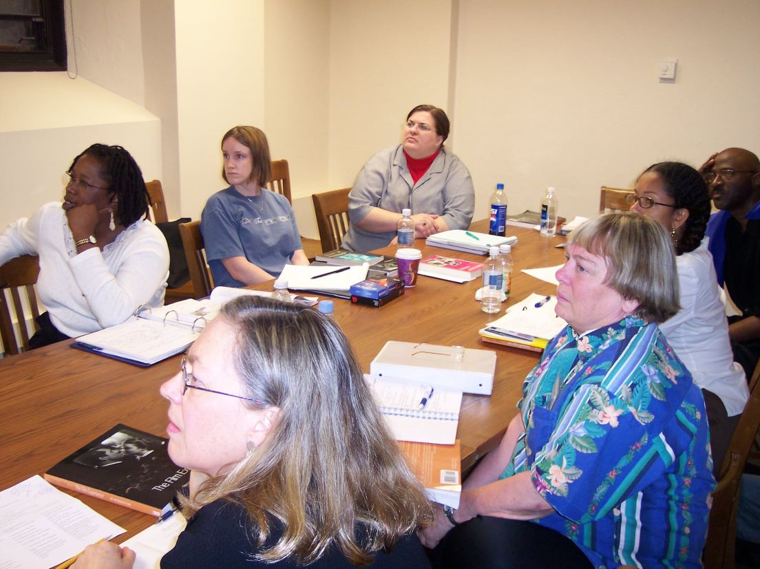 The national seminar on &quot;Stories Around the World in Film,&quot; May 2006. (Clockwise from bottom left: National Fellows Bonnee L. Breese, Philadelphia; Erin E. Blazek Ellis and Jennifer L. Vermillion, Jacksonville; Samuel A. Reed, Philadelphia; Michea R. Carter, Houston; Claudia L. Miller, Santa Fe; and Lynn W. Marsico, Pittsburgh.)