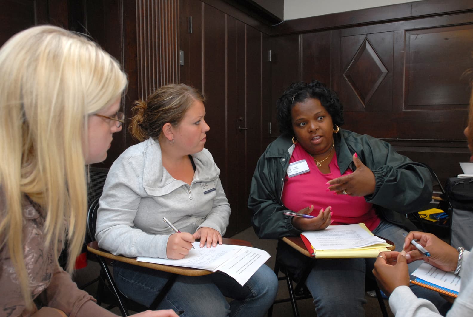 The national seminar on &quot;Keeping the Meaning in Mathematics: The Craft of Word Problems,&quot; July 2007. (Left to right: National Fellows Paula Shaffer-Roche, Pittsburgh; Jill Elizabeth Smith, Charlotte; and Angel Johnson, Chicago.)