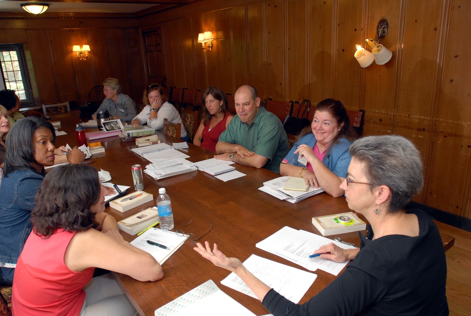 The national seminar on &quot;Maps and Mapmaking,&quot; July 2007. (Clockwise from bottom left: National Fellows Ann Marie Esposito, New Castle County; Stephanie R Wicks, Philadelphia; Janelle A. Price and Sheila Lorraine Carter-Jones, Pittsburgh; Meredith Charlton Tilp, Santa Fe; Kimberly Turner, Richmond; Elizabeth R. Lasure, Charlotte; Ralph E. Russo, New Haven; Mayra Muller-Schmidt, Houston; and seminar leader Mary E. Miller.)