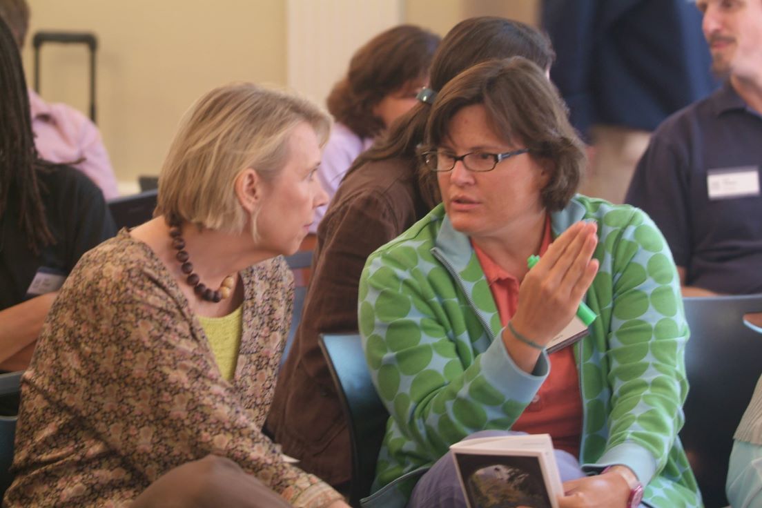Opening Meeting at the Intensive Session, July 2007. (Left to right: Carole Evans, Professor of Moving Image Arts, College of Santa Fe; and National Fellow Danielle Gothie, Santa Fe.)