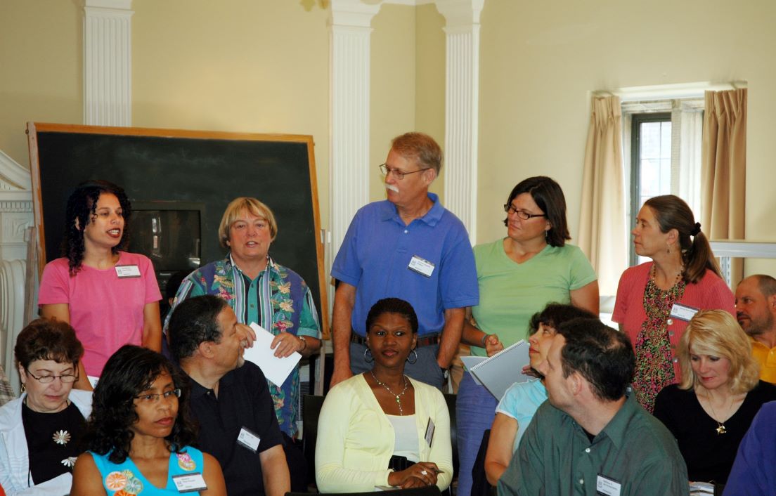 Opening Meeting at the Intensive Session, July 2006. (Standing, left to right: National Fellows Kimberlee Penn Erazo, Claudia L. Miller, Kennan Eugene Girdner, Danielle Gothie and Nancy Ann Wasser, all of Santa Fe.)