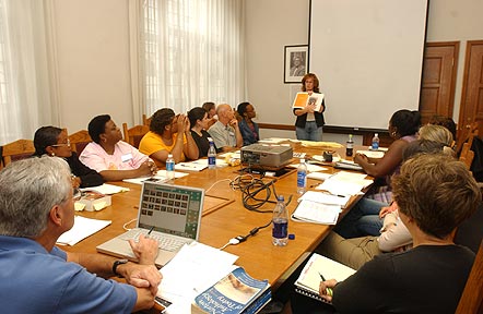 The National Seminar on &quot;Reading Poetry of All Kinds: Pictures, Places and Things, People,&quot; July 2005. (Clockwise from bottom left: Seminar Leader Paul H. Fry; National Fellows Monica Jones Jackson, Houston; Carolyn D. Clark, Richmond; Susan Hillary Greene, Atlanta; Cary Allison Brandenberger and Raymond Theilacker, Wilmington; Mnikesa F. Whitaker, New Haven; Maureen Lynch, Charlotte; Kimberlee Penn Erazo, Santa Fe; Stephanie L. Johnson, Pittsburgh; Clary Washington Carleton, Richmond; and Mary Carol Moran, Jacksonville.)