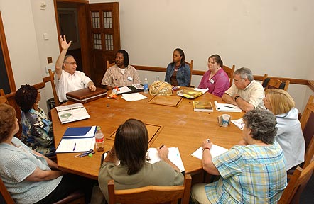 The National Seminar on &quot;Astronomy and Space Sciences,&quot; July 2005. (Clockwise from bottom left: National Fellows Barbara Crews Burton, Jacksonville; Mary J. Jefferson, Houston; Seminar Leader Sabatino Sofia; National Fellows Marty L. Cummings, Ishan Zakia Malik, Atlanta; Crecia Cipriano Swaim, New Haven; Michael William Vasileff, Jacksonville; Kathleen Thompson, Santa Fe; Janet Ruth Purvis, Houston; and Eric James Laurenson, Pittsburgh.)