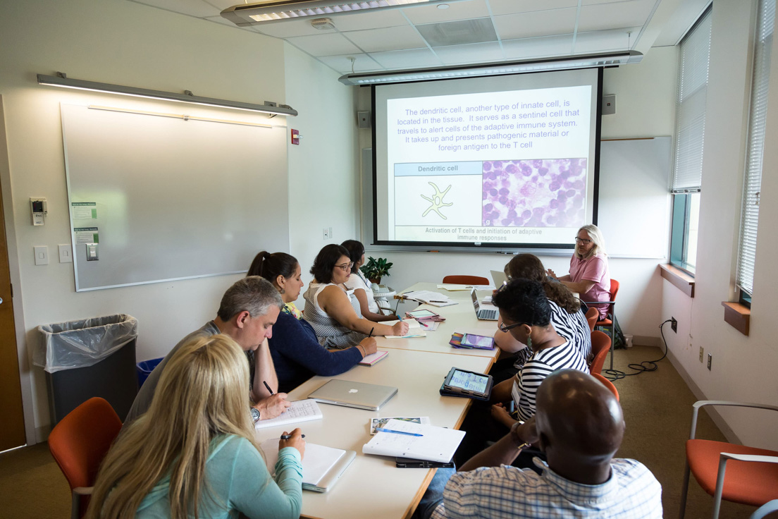 The national seminar on "Physiological Determinants of Global Health," July 2015. (Clockwise from left: National Fellows Dawn B. Curtis, Tulsa; Joe Van Sambeek, San José; Corryn Nikodemski, Delaware; Vanessa Vitug, San José; Priscilla Black, Diné Nation; seminar leader W. Mark Saltzman; National Fellows Sarah Schneider, Chicago; Andrea L. Zullo, New Haven; Tarie Pace, Richmond; and Cristobal Carambo, Philadelphia.)