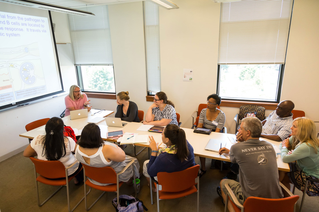 The national seminar on "Physiological Determinants of Global Health," July 2015. (Clockwise from left:National Fellow Priscilla Black, Diné Nation; seminar leader W. Mark Saltzman; National Fellows Sarah Schneider, Chicago; Andrea L. Zullo, New Haven; Tarie Pace, Richmond; Cristobal Carambo, Philadelphia; Dawn B. Curtis, Tulsa; Joe Van Sambeek, San José; Corryn Nikodemski, Delaware; and Vanessa Vitug, San José.)