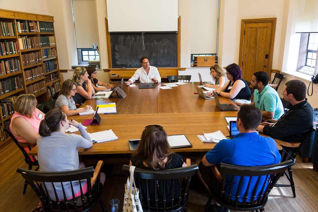 The national seminar on "Playing with Poems: Rules, Tools, and Games," July 2014. (From left to right: National Fellows Jennifer Giarrusso, Pittsburgh; Kristen Leida, New Castle County; Karin V. Foss, San José; Irene Jones, Diné Nation; seminar leader Langdon L. Hammer; National Fellows; Joyce Jacobson, Bay Area; Elizabeth A. Daniell, San José; Jean Capacetti, New Haven; and Sydney H. Coffin, Philadelphia.)