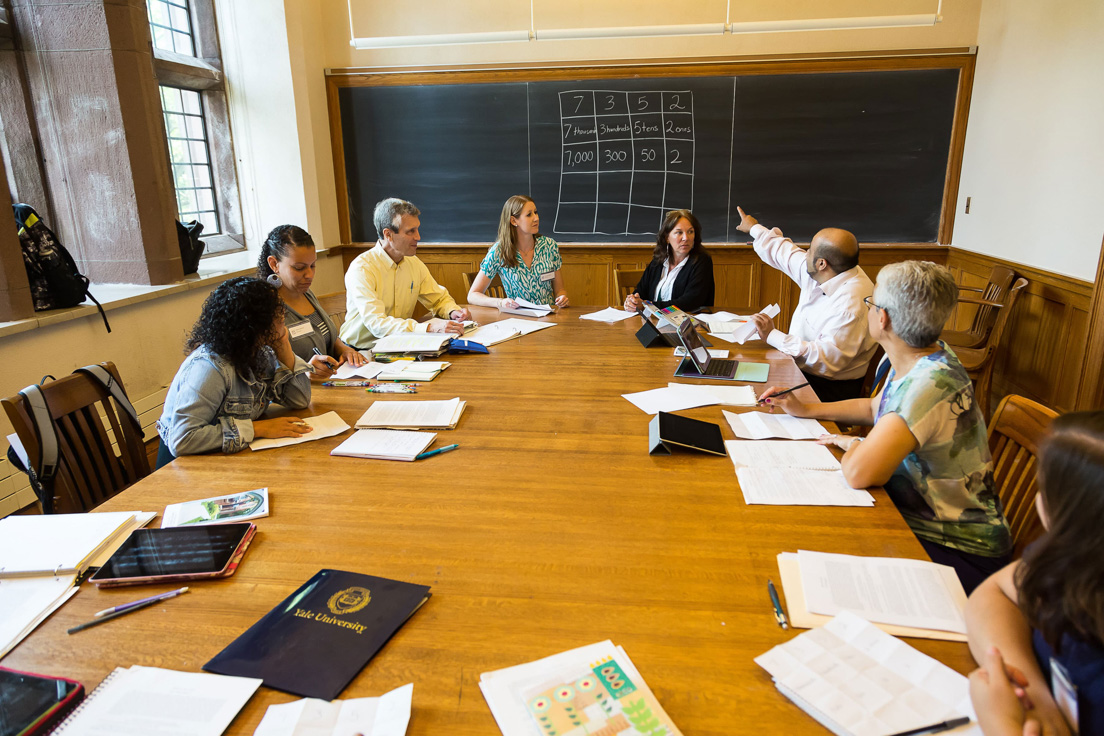 The national seminar on "Place Value, Fractions, and Algebra: Improving Content Learning through the Practice Standards," July 2014. (From left to right: National Fellow Marissa J. Brown, San José; seminar leader Roger E. Howe; National Fellows Torrieann M. Kennedy, Charlotte; Patricia Lee, Pittsburgh; Rajendra K. Jaini, Richmond; and Nancy Rudolph, New Castle County.)