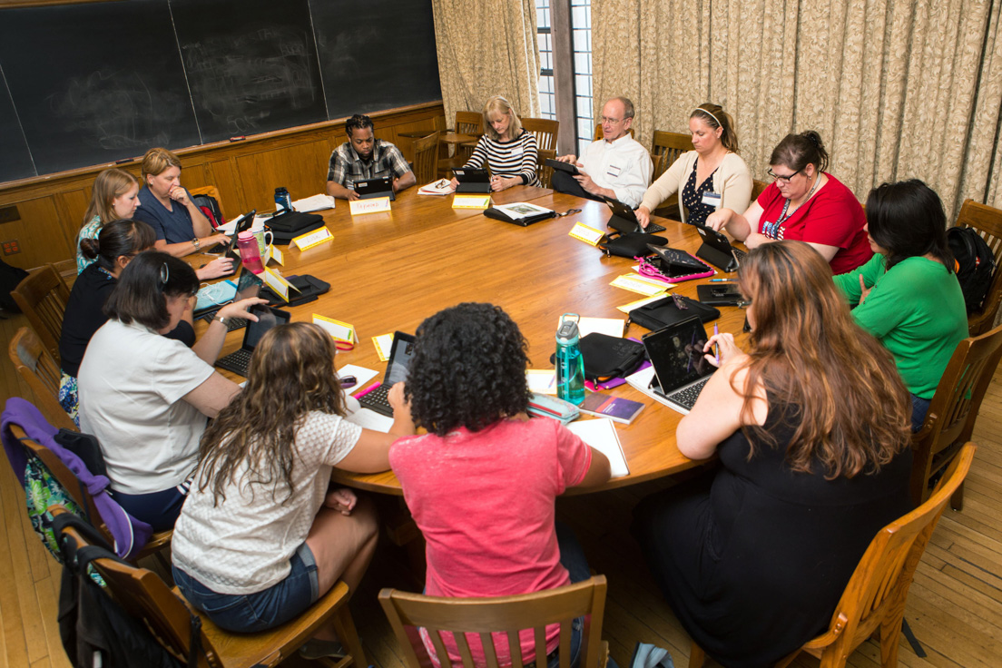 The national seminar on "The Art of Biography," July 2013. (Clockwise from bottom left: National Fellows Michelle Hilbeck, New Castle County;  Terry Anne Wildman, Philadelphia; Audrelia R. Dugi, Din&#233; Nation; Torrieann M. Dooley, Charlotte; Lisa Christenson, San Mateo County; Raymond Smith, Chicago; Carol P. Boynton, New Haven; seminar leader John L. Gaddis; National Fellows Sonia Henze, Pittsburgh; Audra K. Bull, Tulsa; Camille Pires, Emery Unified; Elizabeth A. Daniell, San Jos&#233;; and Taylor Davis, Richmond.)