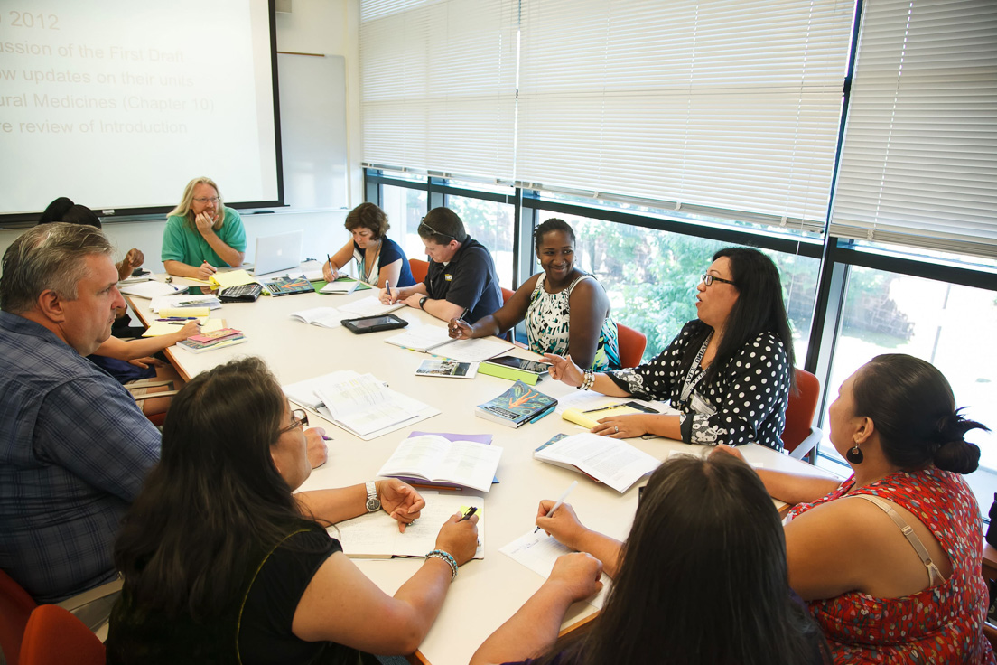 The national seminar on "How Drugs Work," July 2012. (Clockwise from left: National Fellow John Miklaszewski ; seminar leader W. Mark Saltzman; and National Fellows Valerie Schwarz, Stephen Lewia, Tracy Lewis, Marlene Gutierrez, Vanessa Vitug, Jolene Smith, and Marilyn Dempsey.]