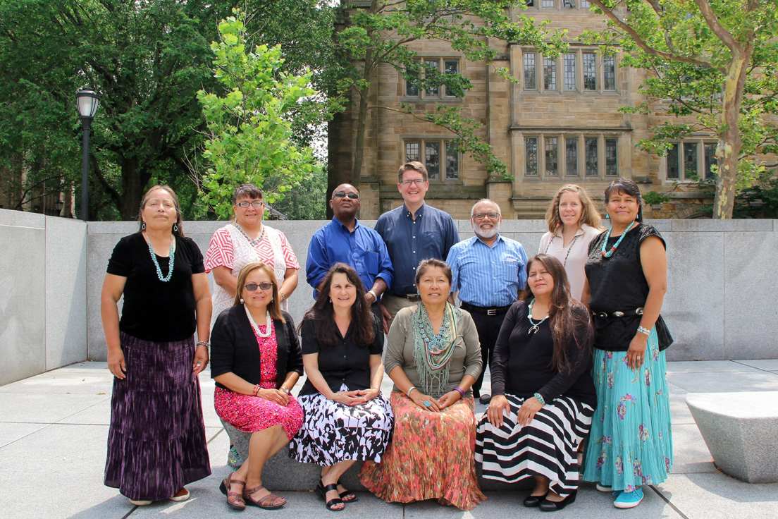 Diné Nation and Northern Arizona University Team at the Intensive Session, July 2017. (Standing from left to right: National Fellows Jolene Smith, Joyce Tsinijinnie; Eric Otenyo, Professor of Politics and International Affairs, Northern Arizona University; Jeff Berglund, Proessor of English, Northern Arizona University; Max Dass, Professor of Science Teaching and Learning, Northern Arizona University; Angelina E. Castagno, Planning Director, Northern Arizona University; National Fellow Prisicilla Black. Seated from left to right: National Fellow Irene Jones; Karen Jarratt-Snider, Associate Professor of Applied Indigenous Studies, Northern Arizona University; National Fellows Shirley Paulson and Elizabeth Isaac.)