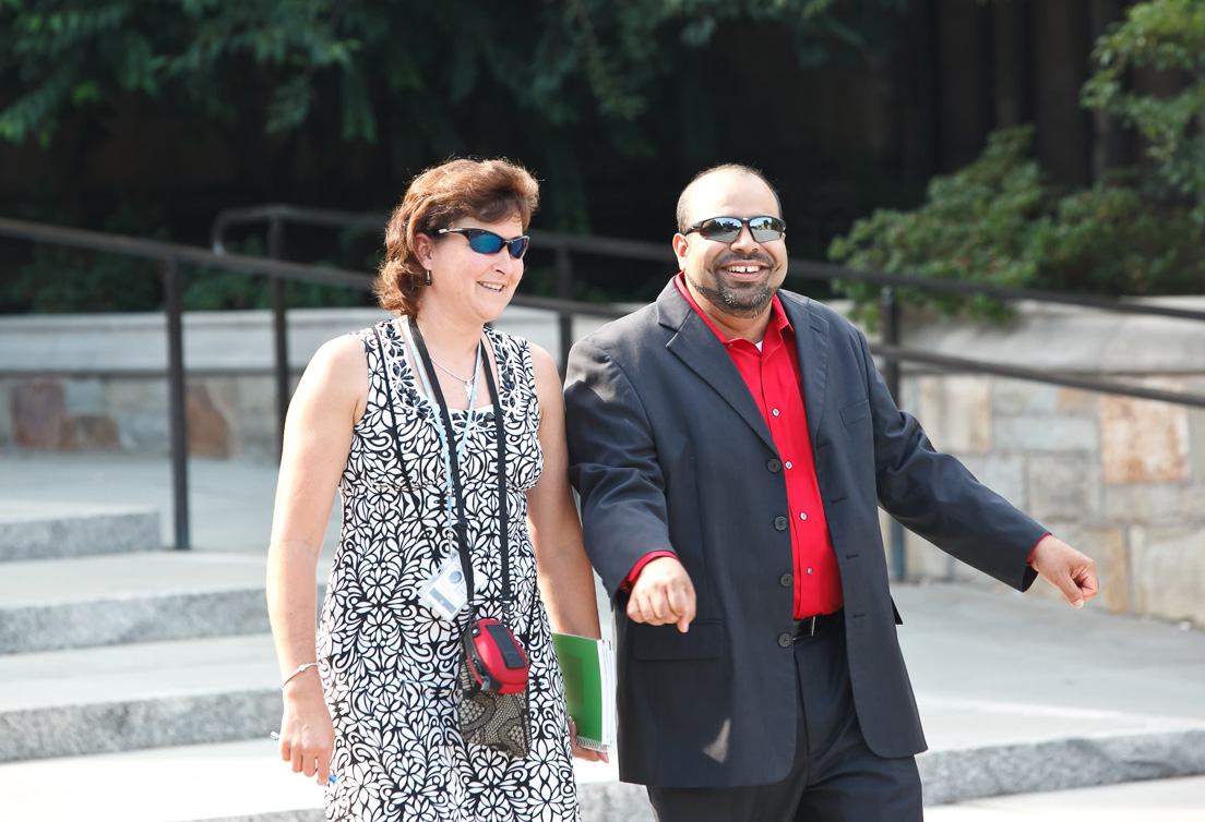 National Fellows at the Intensive Session, July 2011. (Left to
right: Valerie J. Schwarz and Rajendra K. Jaini, Richmond.)