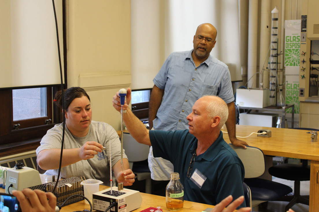 The national seminar on "Microbes Rule!" July 2014. (From left to right: National Fellow Maria Orton, Pittsburgh; seminar leader Paul E. Turner; and National Fellow Phil Carver, Charlotte.)