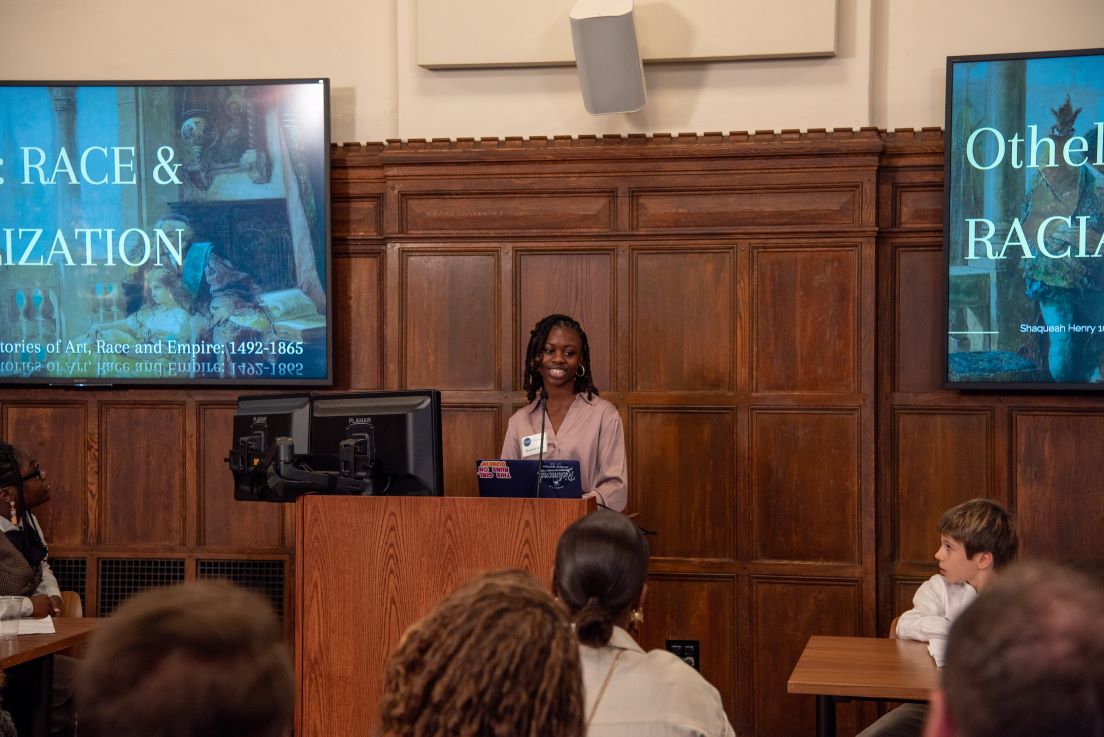 Shaqueah Henry, a twelfth-grade student from Philadelphia, presents her work from a curriculum unit developed in a national seminar by National Fellow Tyriese J. Holloway.