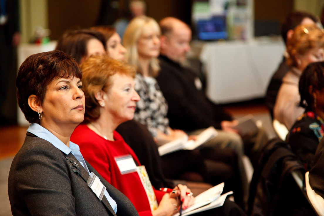 Opening Session at the Annual Conference, October 2010. (From left to right: Christine Smith, Manager of Professional Development, Red Clay Consolidated School District; and Eleanor S. Ludwigsen, Director of School Improvement Services, Christina School District.)