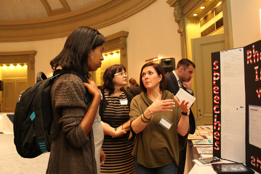 Displays of Student Work from Curriculum Units Developed in National Seminars, Annual Conference, October 31-November 1, 2014. (From left to right: Danielle Neves, Tulsa; Jennifer Vermillion, San José; Jo A. Stafford, Tulsa; and Brandon Barr, Chicago.)